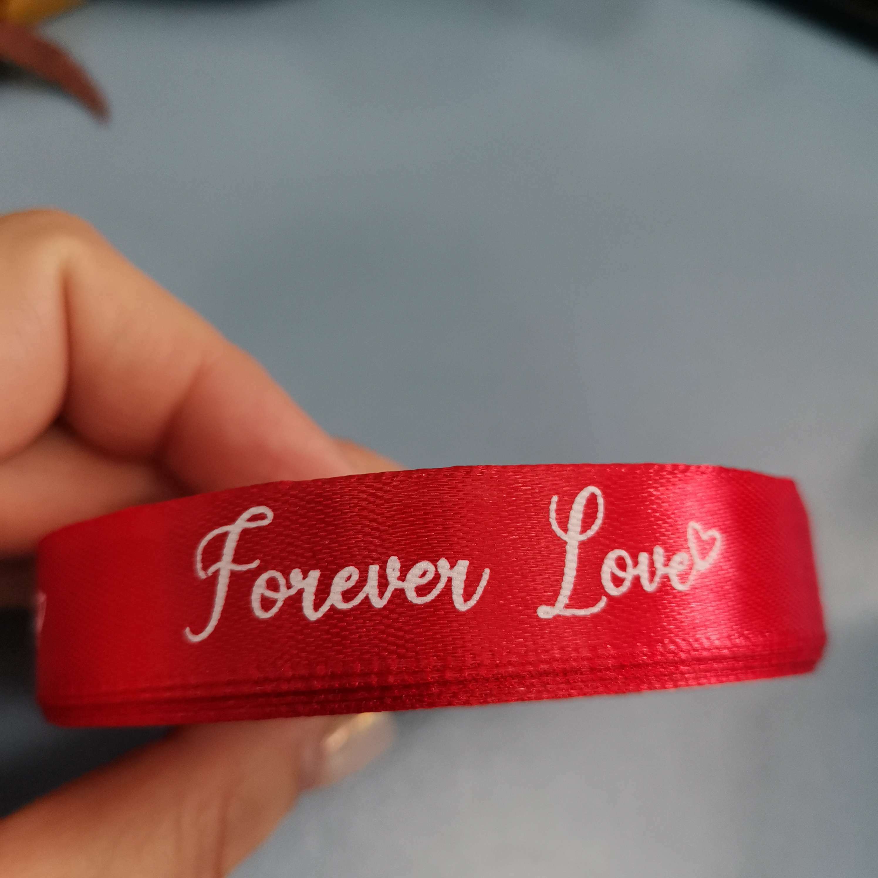 Фотография покупателя товара Лента атласная «Forever love», 15 мм × 23 ± 1 м, цвет красный - Фото 2