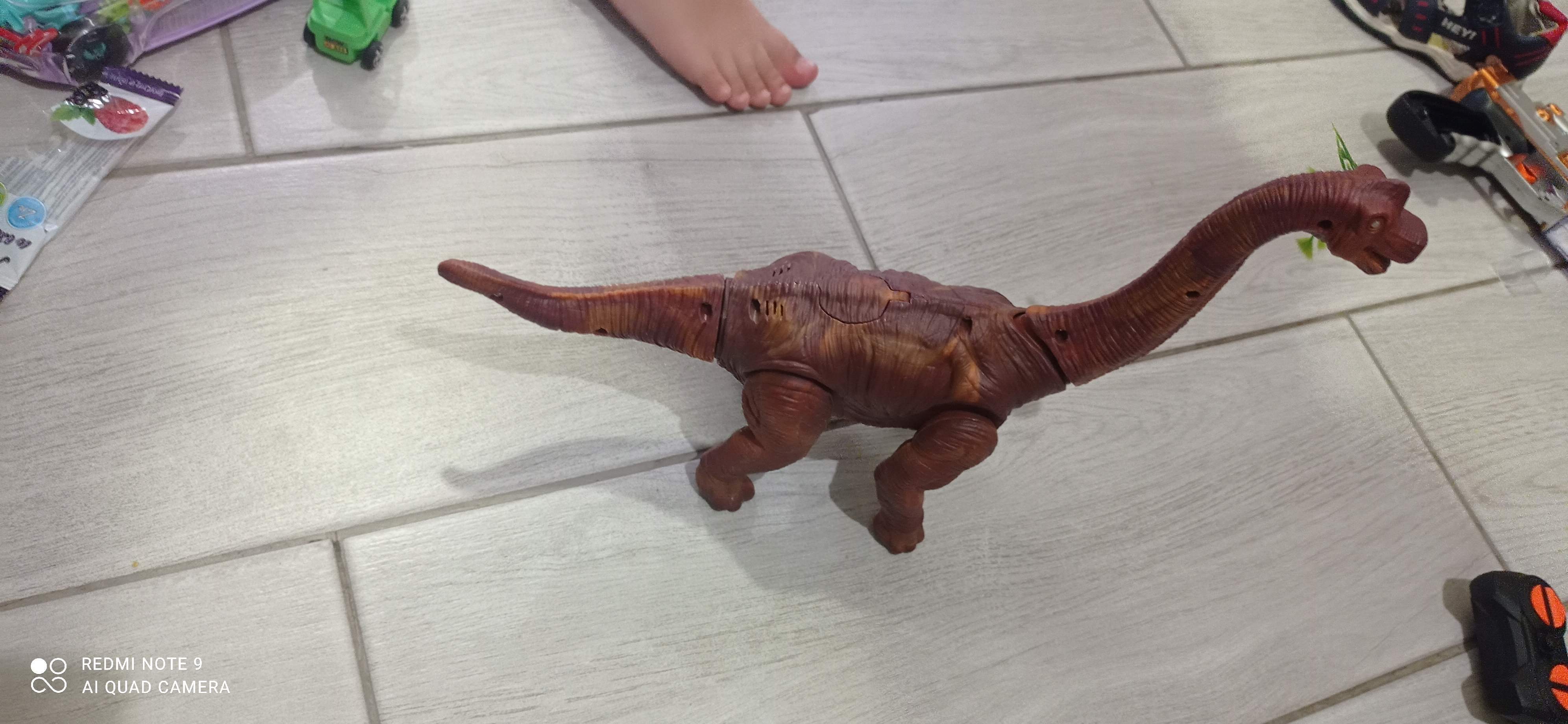 Фотография покупателя товара Динозавр «Брахиозавр травоядный», работает от батареек, откладывает яйца, с проектором, цвет коричневый - Фото 1