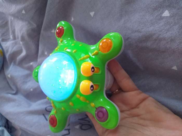 Фотография покупателя товара Развивающая игрушка «Осьминог», световые и звуковые эффекты, цвета МИКС - Фото 2