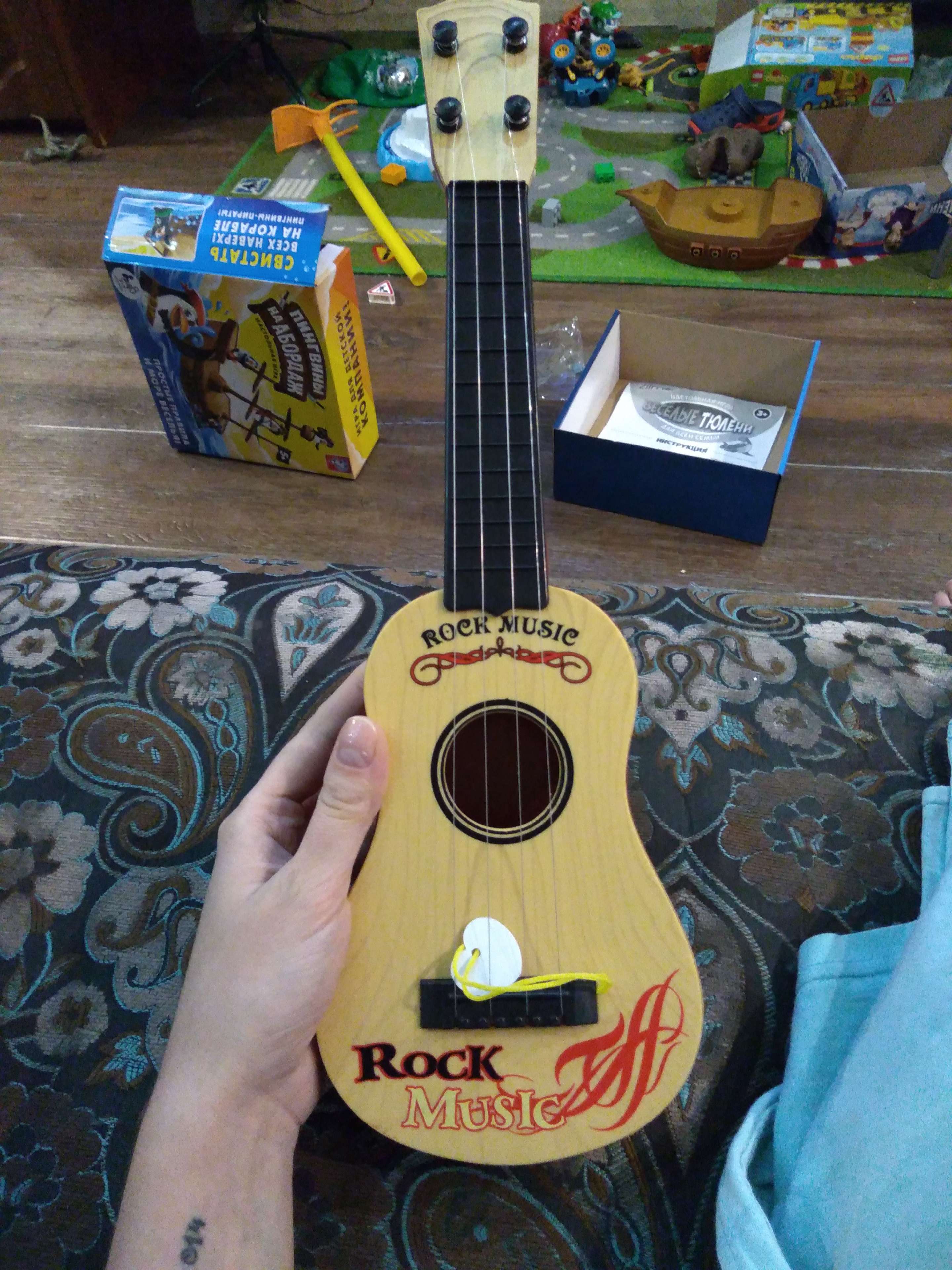 Фотография покупателя товара Детский музыкальный инструмент «Гитара: Классика», цвета МИКС - Фото 9