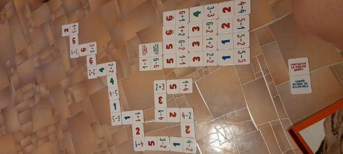 Фотография покупателя товара Настольная игра «Учимся считать. Математическое домино. Складываем и вычитаем», 30 карт,4+ - Фото 1