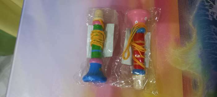 Фотография покупателя товара Музыкальная игрушка «Дудочка на веревочке», высокая, цвета МИКС - Фото 4