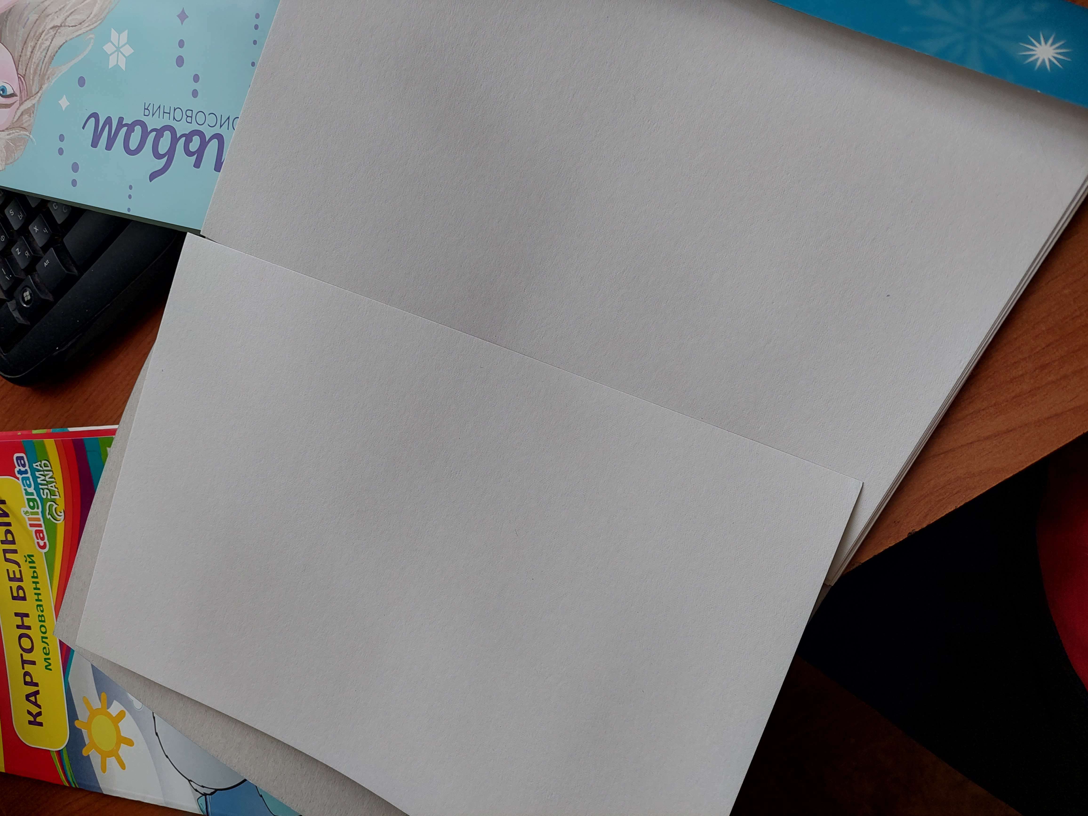 Фотография покупателя товара Картон белый, А4, 16 листов, немелованный, односторонний, в папке, 220, г/м², Холодное сердце - Фото 3