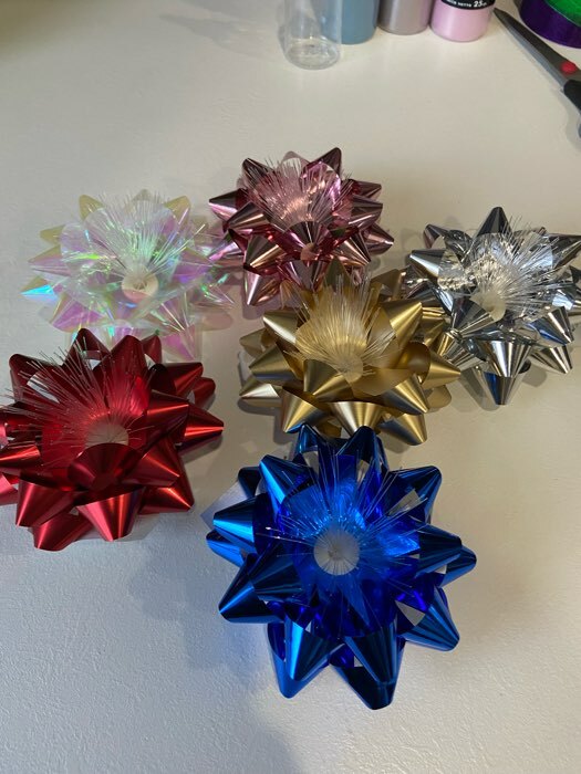 Фотография покупателя товара Светодиодная игрушка «Бант-звезда» 9 × 6 × 9 см, батарейки LR44х3, свечение мульти, синяя - Фото 5