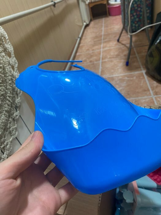 Фотография покупателя товара Нагрудник для кормления пластиковый с карманом, цвет сининй - Фото 1