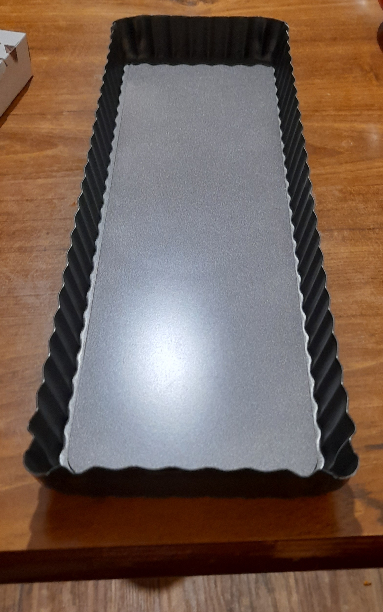 Фотография покупателя товара Форма для выпечки «Жаклин. Прямоугольник рифлёный», 35×11×2.5 см, съёмное дно, антипригарное покрытие, чёрная - Фото 2