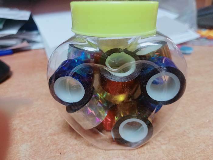Фотография покупателя товара Клейкая лента пластик в банке "Голография" (набор 10 шт) цвета МИКС 1,2смх1м 6,3х5,3х3,4см - Фото 2
