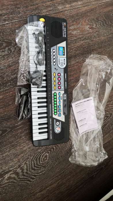 Фотография покупателя товара Синтезатор «Маленький музыкант», с микрофоном, 49 клавиш, цвет чёрный - Фото 2