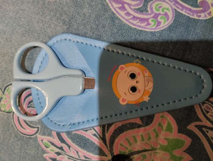 Фотография покупателя товара Детские, безопасные, маникюрные ножницы «Мишка», цвет голубой - Фото 1