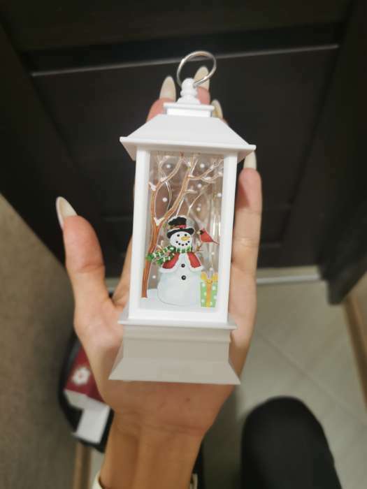Фотография покупателя товара Светодиодная фигура «Фонарь со снеговиком» 5.5 × 13 × 5.5 см, пластик, батарейки AG13х3, свечение тёплое белое