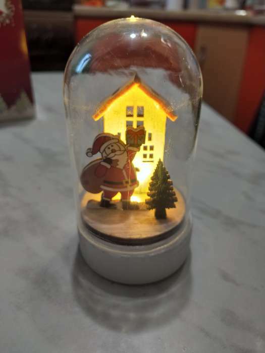 Фотография покупателя товара Светодиодная фигура под куполом «Дед Мороз с мешком» 6 × 9.5 × 6 см, дерево, батарейки LR1130х3, свечение тёплое белое