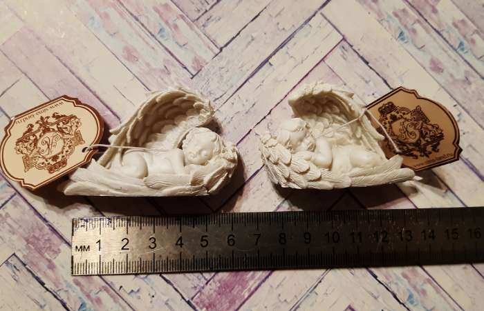Фотография покупателя товара Сувенир полистоун "Белоснежный ангелочек спящий в крыльях" МИКС 4х6,5х2,5 см