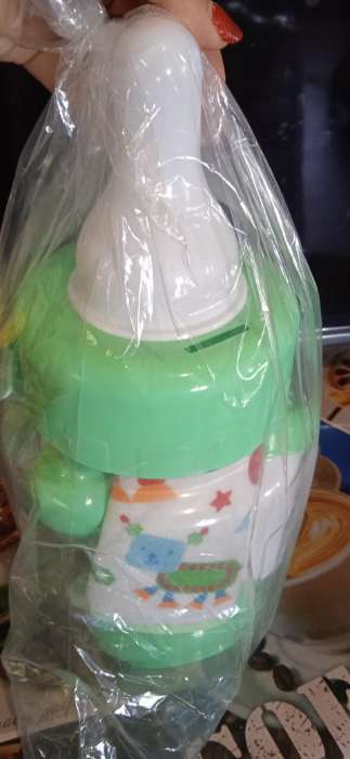 Фотография покупателя товара Набор детский «Первый подарок малышу», 10 предметов: бутылочки для кормления 150 и 250 мл, поильник, посуда, нагрудник, расчёска, щётка, цвет зелёный - Фото 4