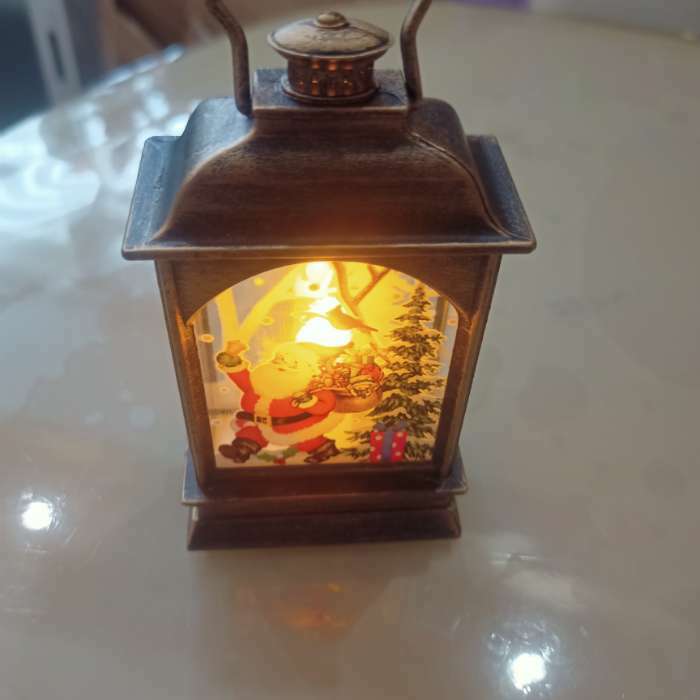 Фотография покупателя товара Светодиодная фигура «Фонарь с Дедом Морозом» 7 × 13 × 3.5 см, пластик, батарейки AG13х3, свечение тёплое белое - Фото 3
