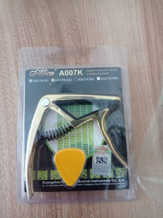 Фотография покупателя товара Каподастр для акустической гитары Alice A007K/GD золото