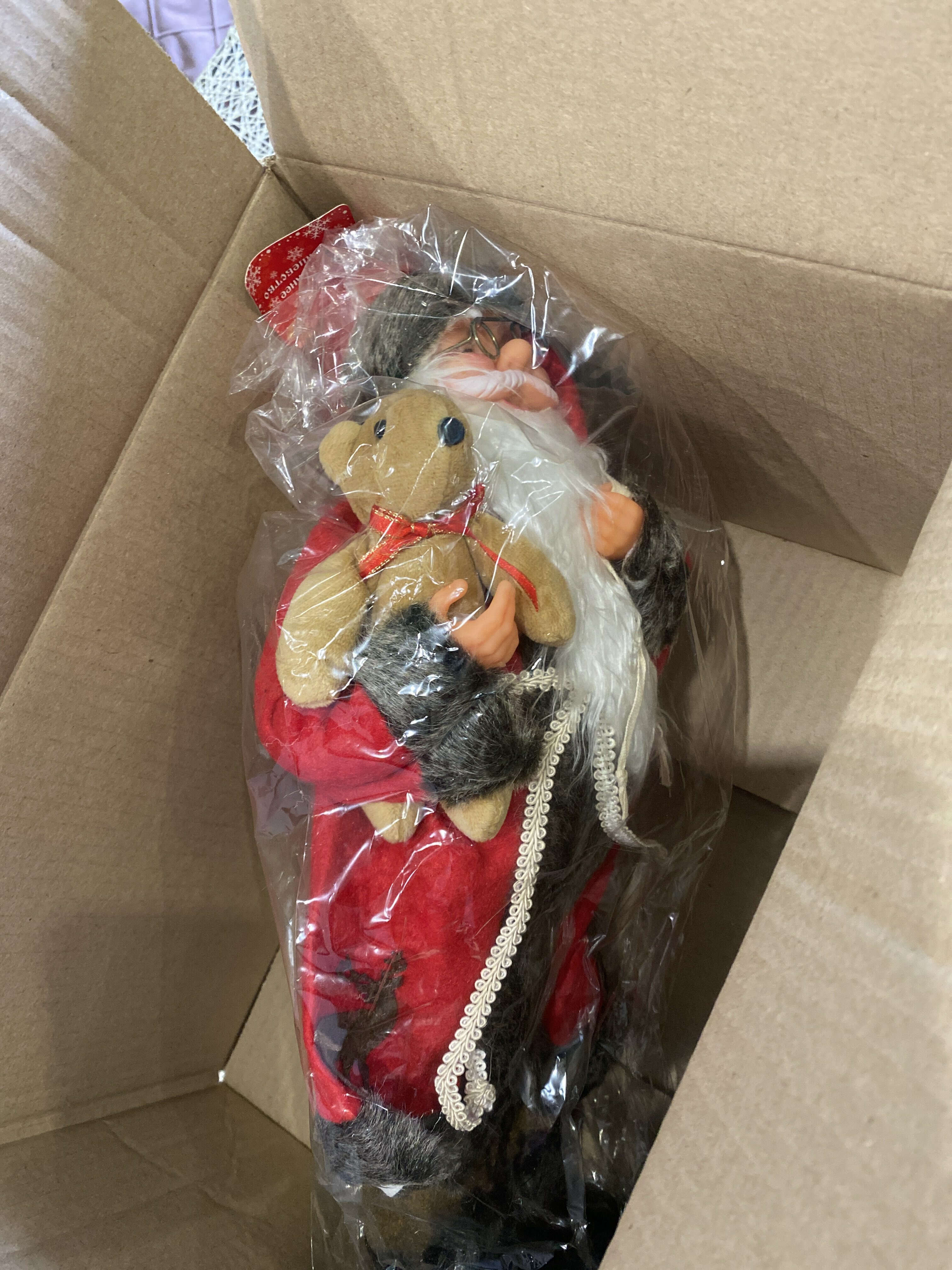 Фотография покупателя товара Дед Мороз "В красной шубке с мишкой" 30 см - Фото 6