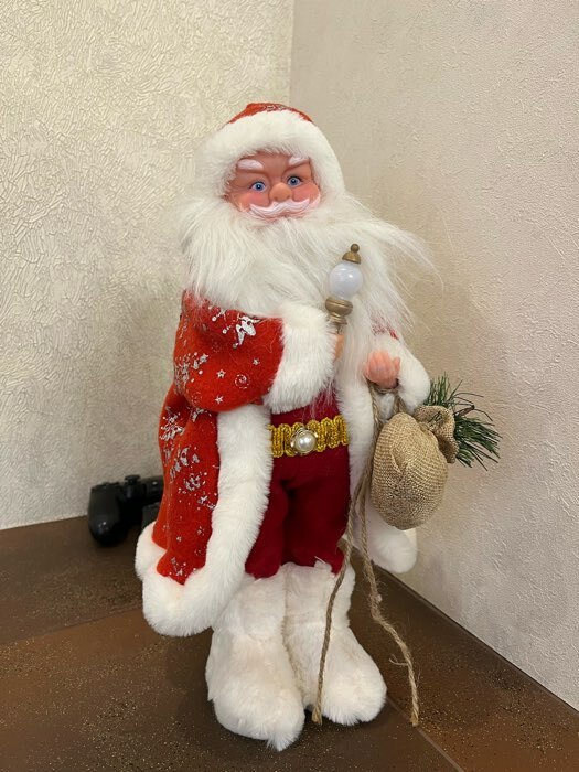 Фотография покупателя товара Дед Мороз "В красной шубке в ёлочках с подарками" двигается, 20х40 см - Фото 7