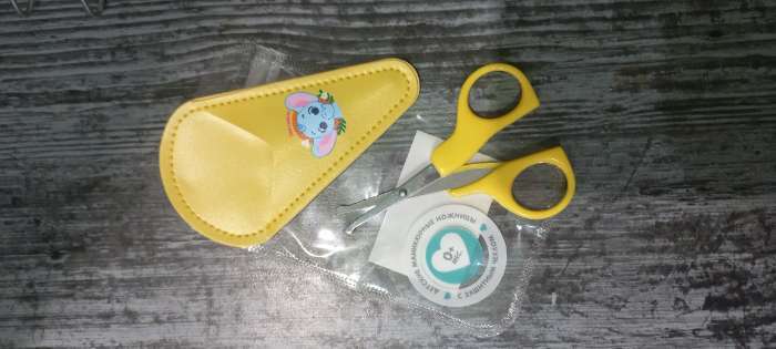 Фотография покупателя товара Детские, безопасные, маникюрные ножницы «Слоник», цвет жёлтый