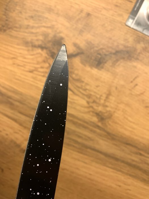 Фотография покупателя товара Нож кухонный с антиналипающим покрытием «Санктум», лезвие 12,5 см, цвет чёрно-коричневый - Фото 3