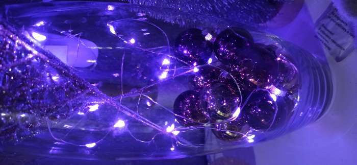 Фотография покупателя товара Гирлянда «Нить» 2 м роса, IP20, серебристая нить, 20 LED, свечение фиолетовое, CR2032х2 - Фото 2