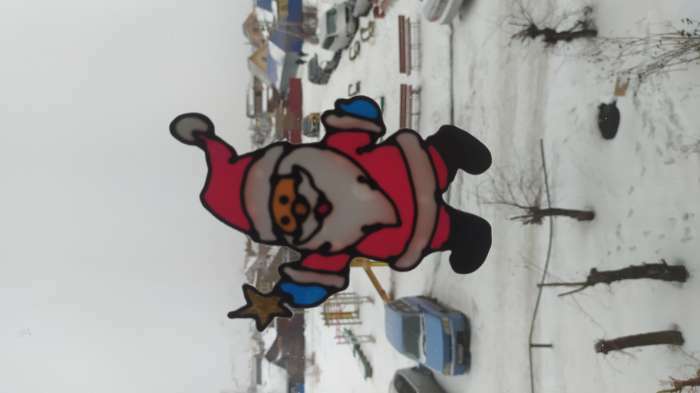 Фотография покупателя товара Наклейка на стекло "Дед Мороз танцующий" 14х9 см - Фото 2