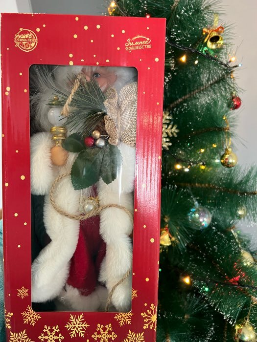 Фотография покупателя товара Дед Мороз "В красной шубке в ёлочках с подарками" двигается, 20х40 см - Фото 3