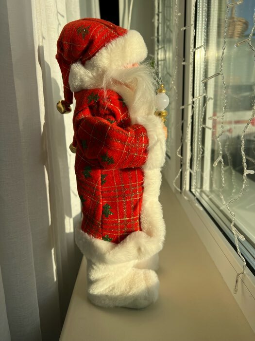 Фотография покупателя товара Дед Мороз "В красной шубке в ёлочках с подарками" двигается, 20х40 см - Фото 5