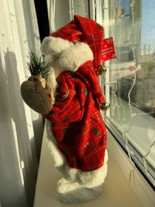 Фотография покупателя товара Дед Мороз "В красной шубке в ёлочках с подарками" двигается, 20х40 см - Фото 2