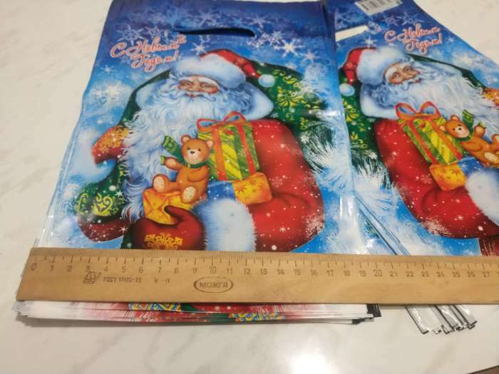 Фотография покупателя товара Пакет полиэтиленовый "Новогодняя метель" с вырубной ручкой, 20 х 30 см , 30 мкм - Фото 2