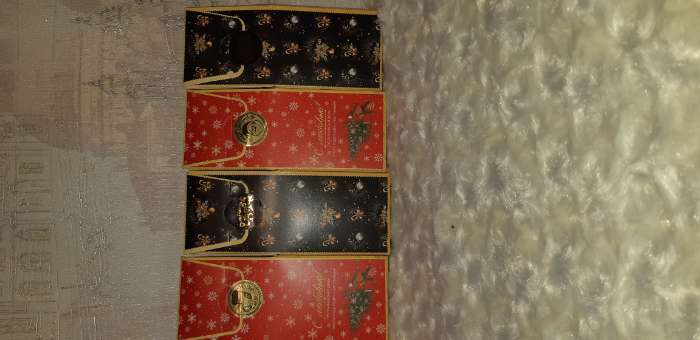 Фотография покупателя товара Наклейки c тиснением в рулоне "С Рождеством!", 500 шт, 2,5 х 2,5 см - Фото 4