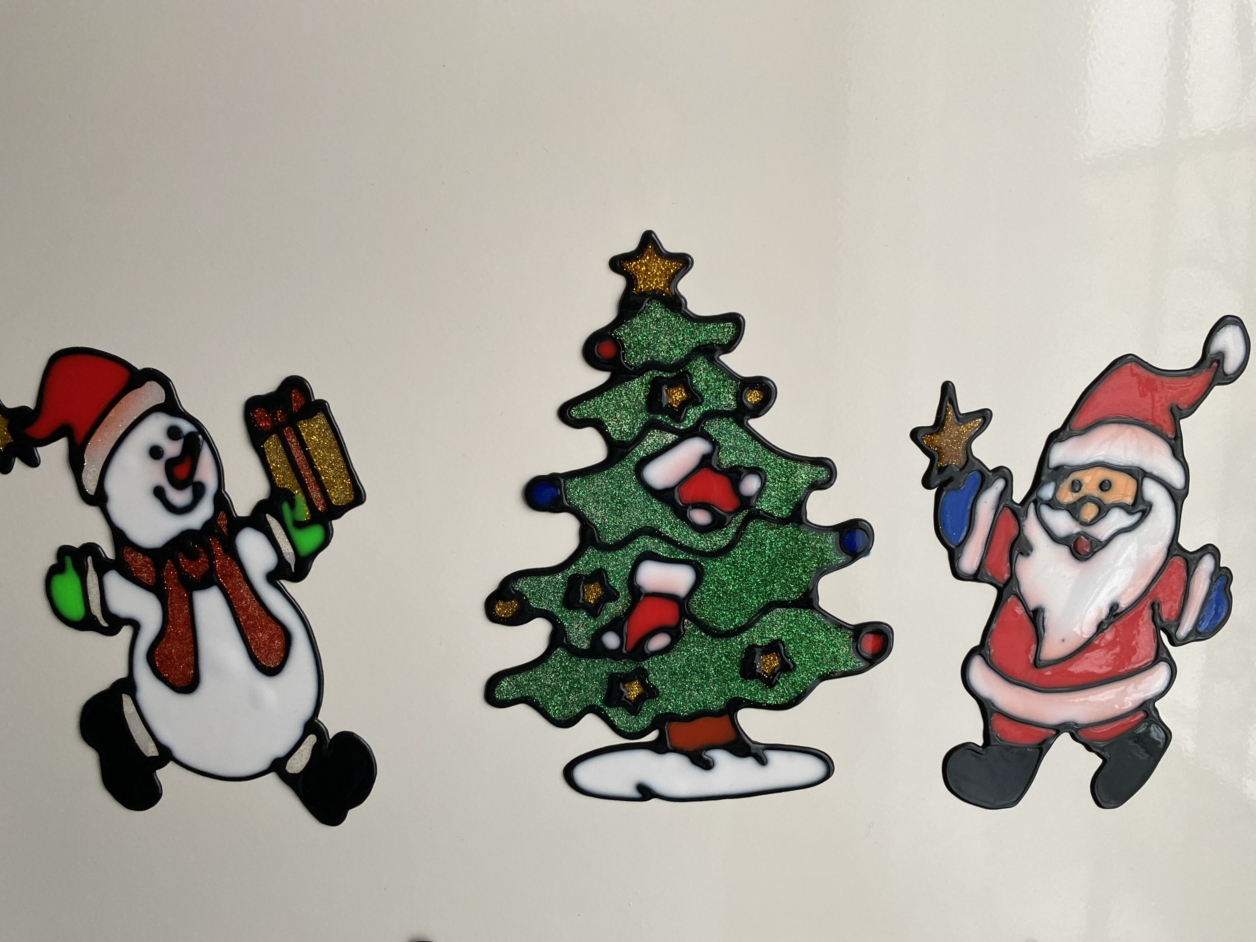Фотография покупателя товара Наклейка на стекло "Дед Мороз со звездой" 9,5х14,5 см - Фото 1
