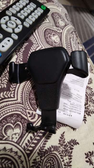 Фотография покупателя товара Держатель телефона Cartage в дефлектор, самозажимной захват 6-9.5 см, черный