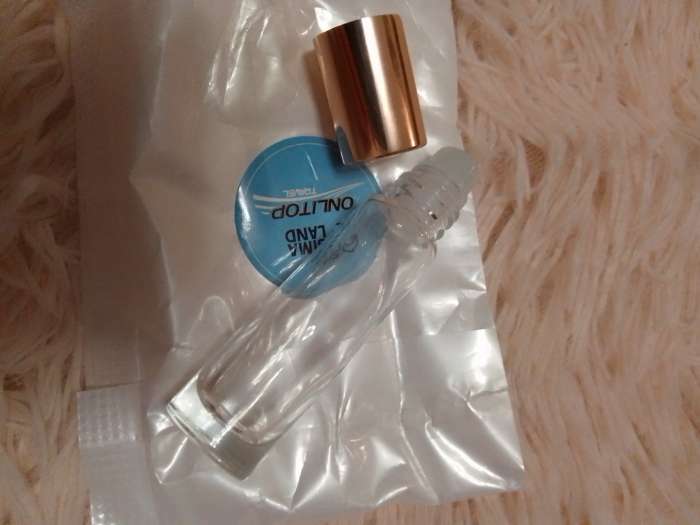Фотография покупателя товара Флакон стеклянный для парфюма, со стеклянным роликом, 10 мл, цвет прозрачный/розовое золото - Фото 1