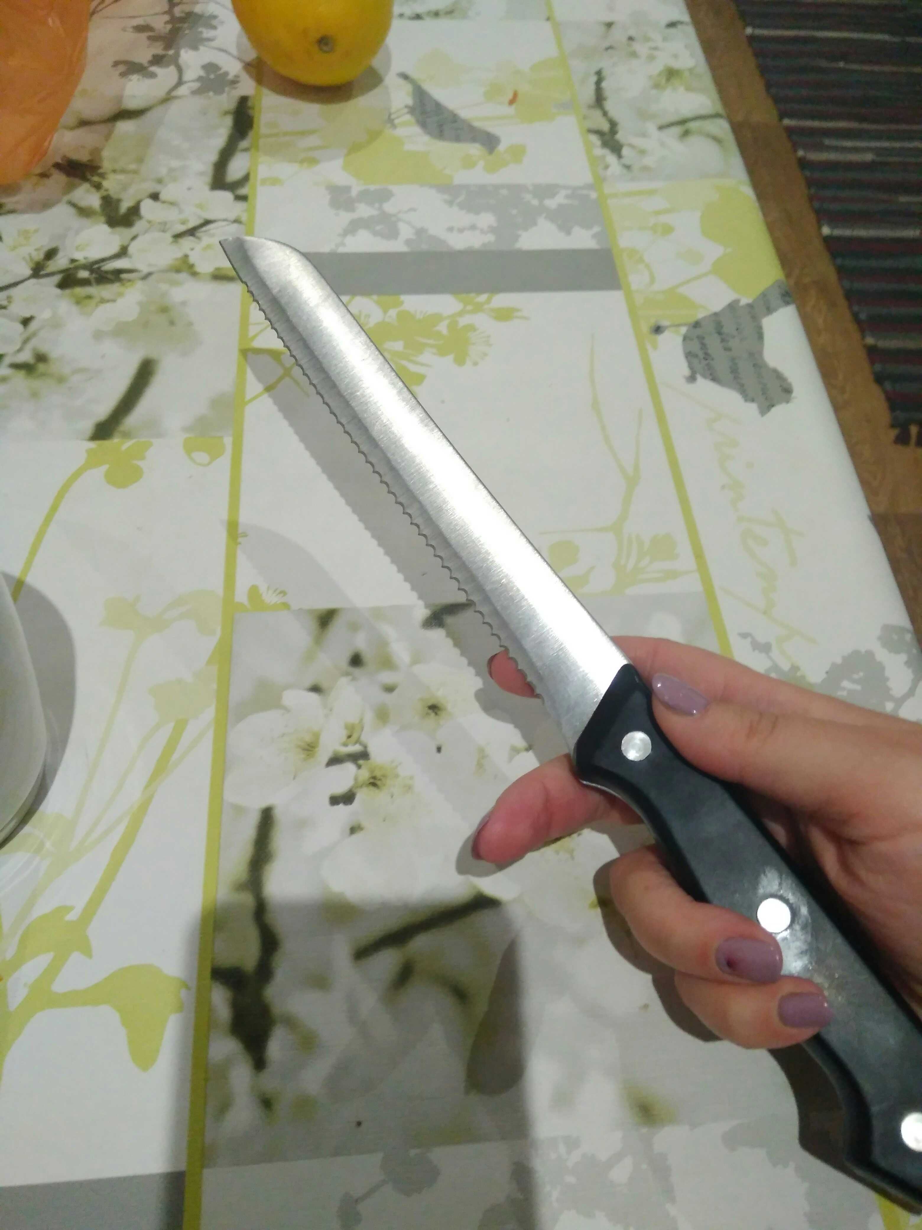 Фотография покупателя товара Нож для хлеба Доляна «Универсал», зубчатое лезвие 19,5 см, цвет чёрный - Фото 1