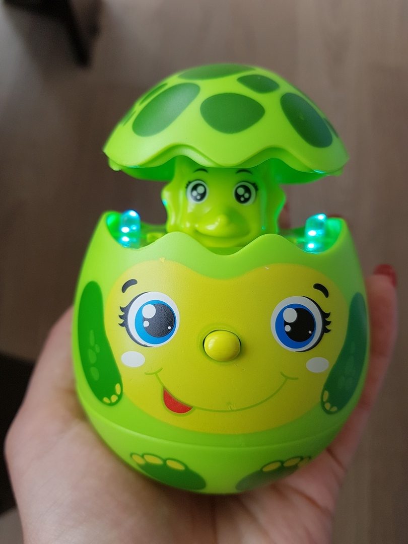 Фотография покупателя товара Развивающая музыкальная игрушка «Яйцо-сюрприз Черепашка», световые и звуковые эффекты