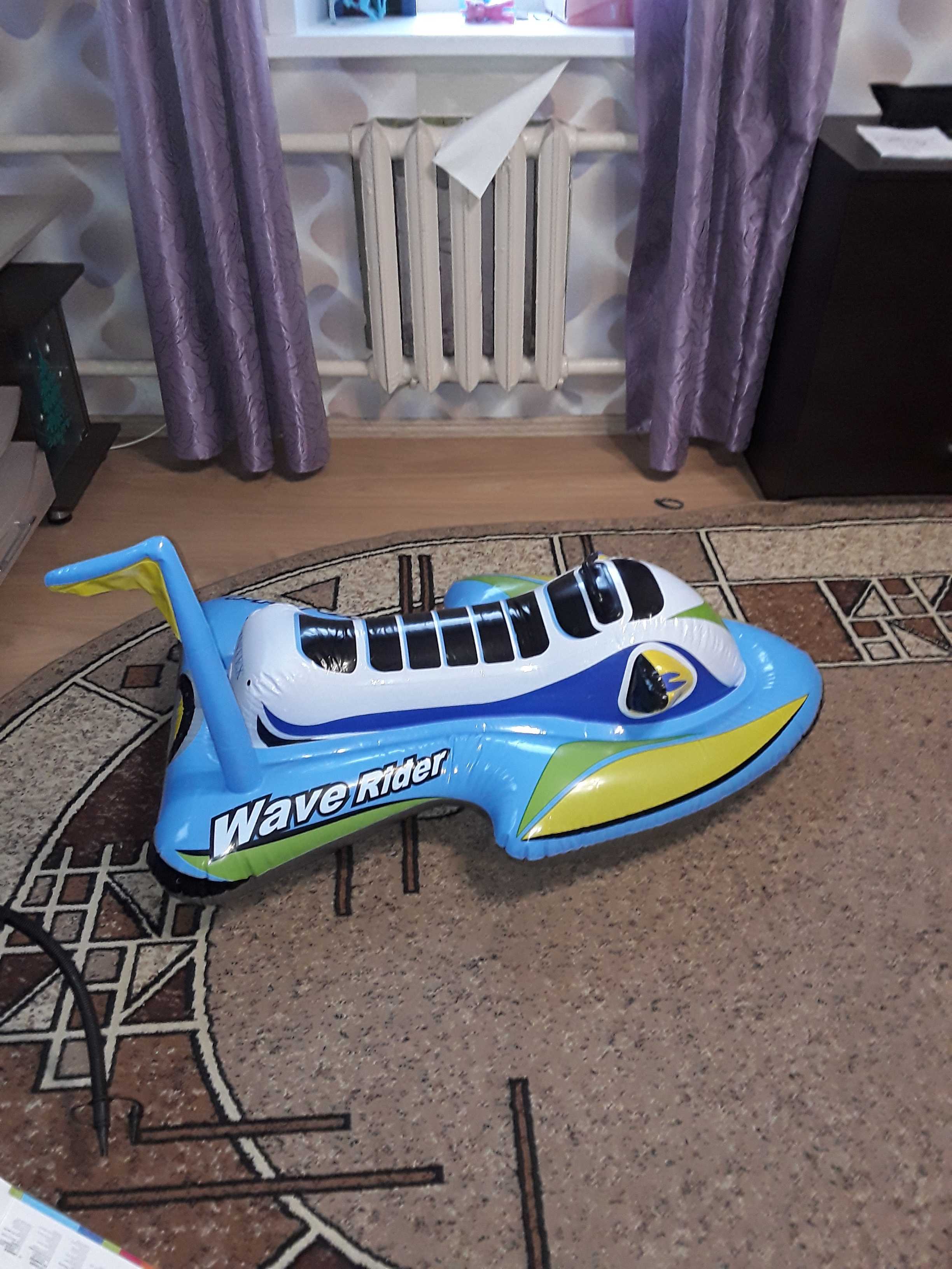 Фотография покупателя товара Игрушка надувная для плавания «Скутер» с ручками, 117 х 77 см, от 3 лет, 57520NP INTEX, цвет МИКС - Фото 5