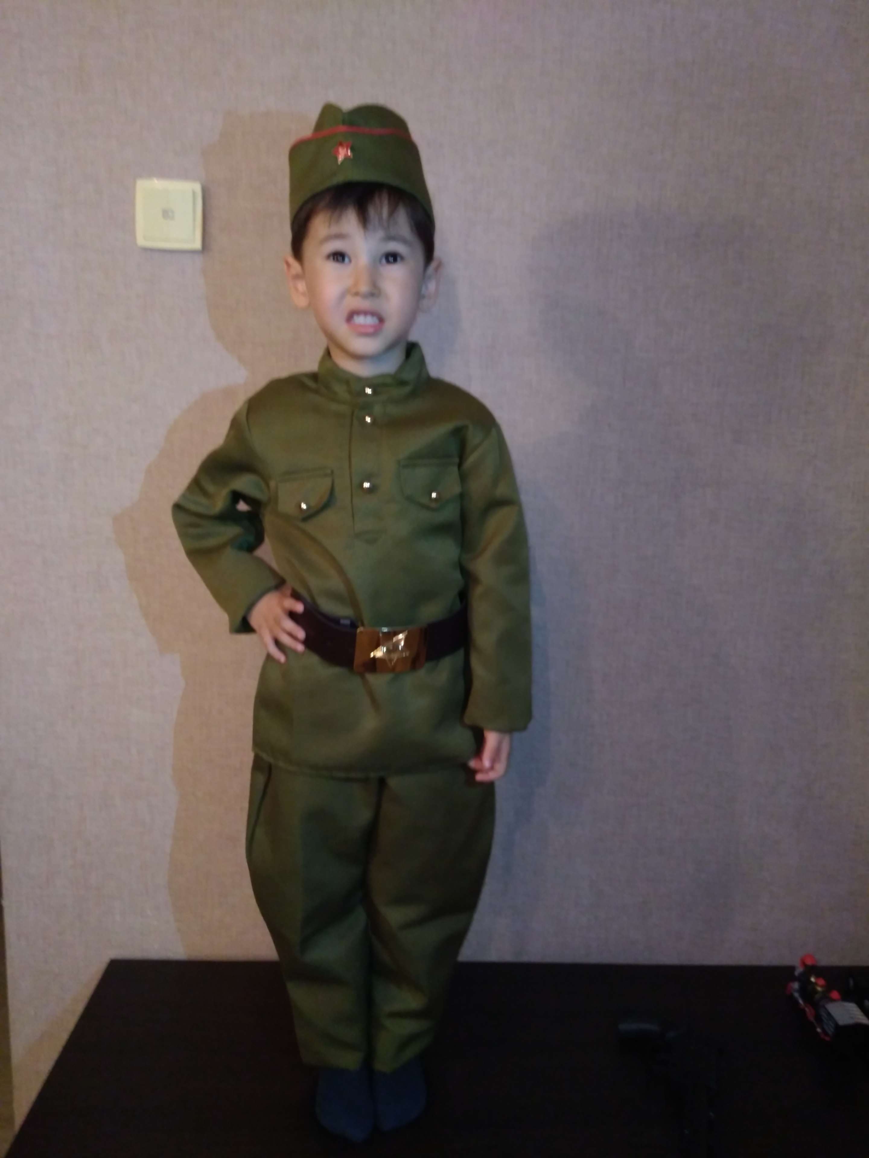 Фотография покупателя товара Детский карнавальный костюм "Военный", брюки, гимнастёрка, ремень, пилотка, р-р 28-32, рост 110-120 см
