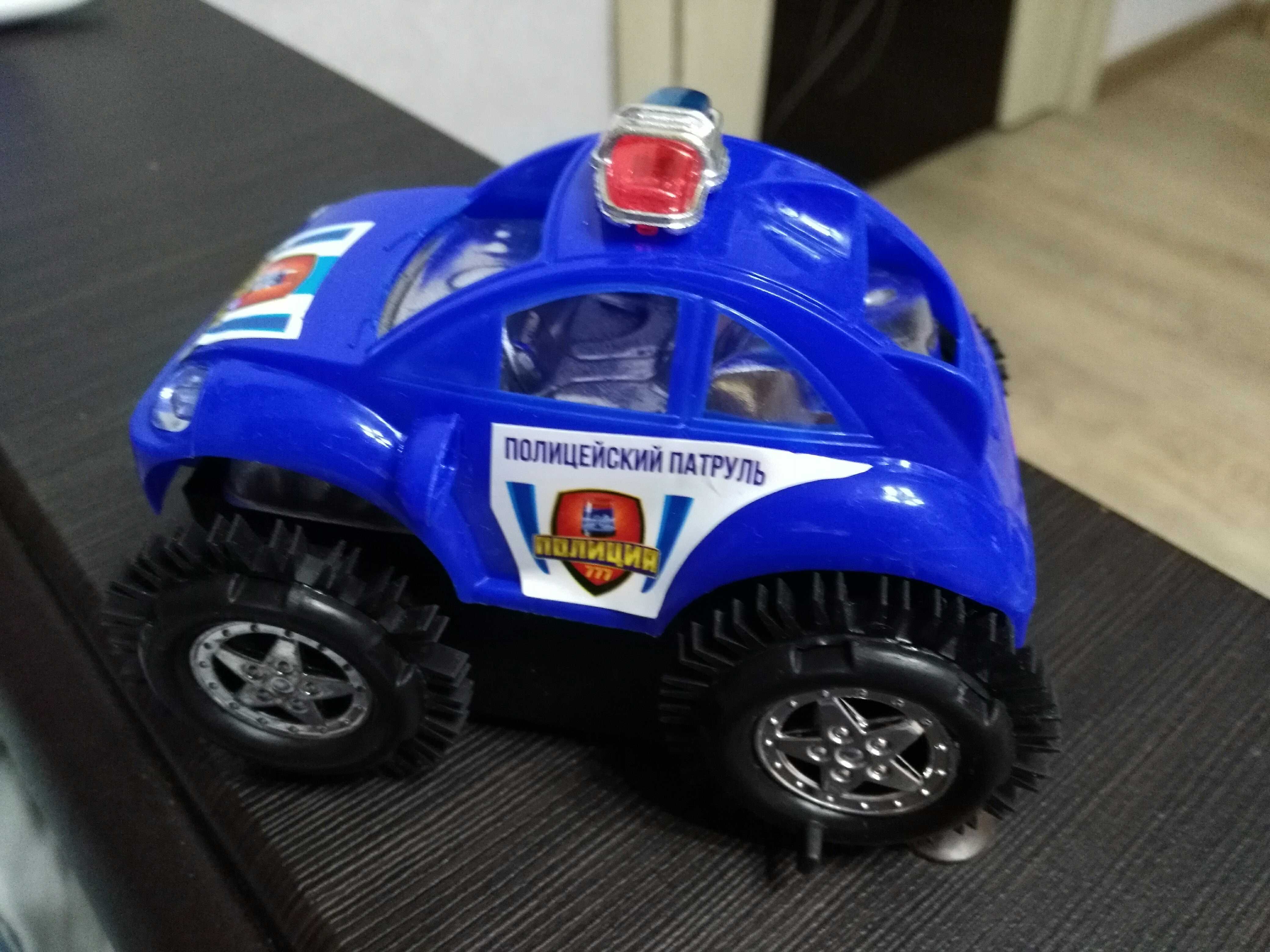 Фотография покупателя товара Машина-перевёртыш «Полиция», работает от батареек, цвета МИКС