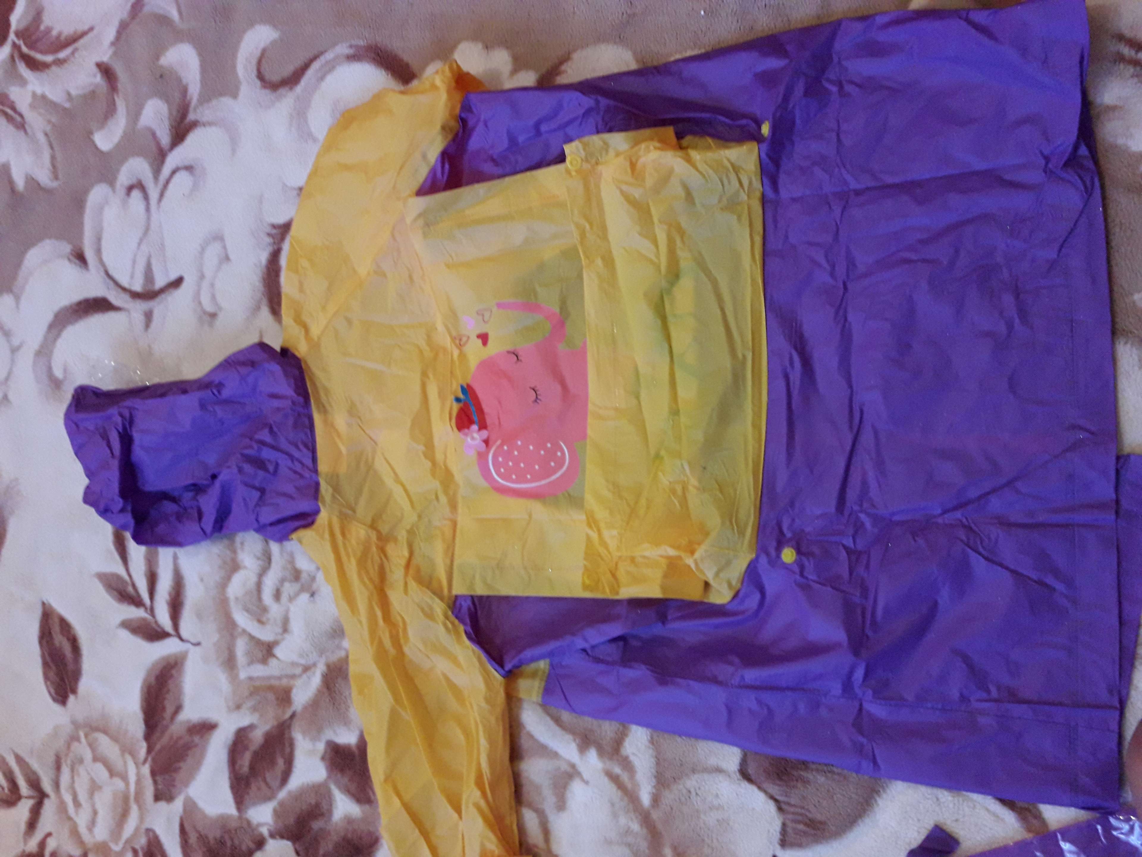 Фотография покупателя товара Дождевик детский «Слонёнок», карман под рюкзак, капюшон с козырьком, рост 100-110 - Фото 3