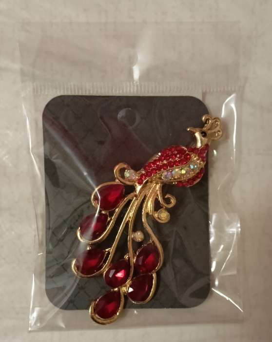 Фотография покупателя товара Брошь «Жар-птица» волшебная, цвет красный в золоте