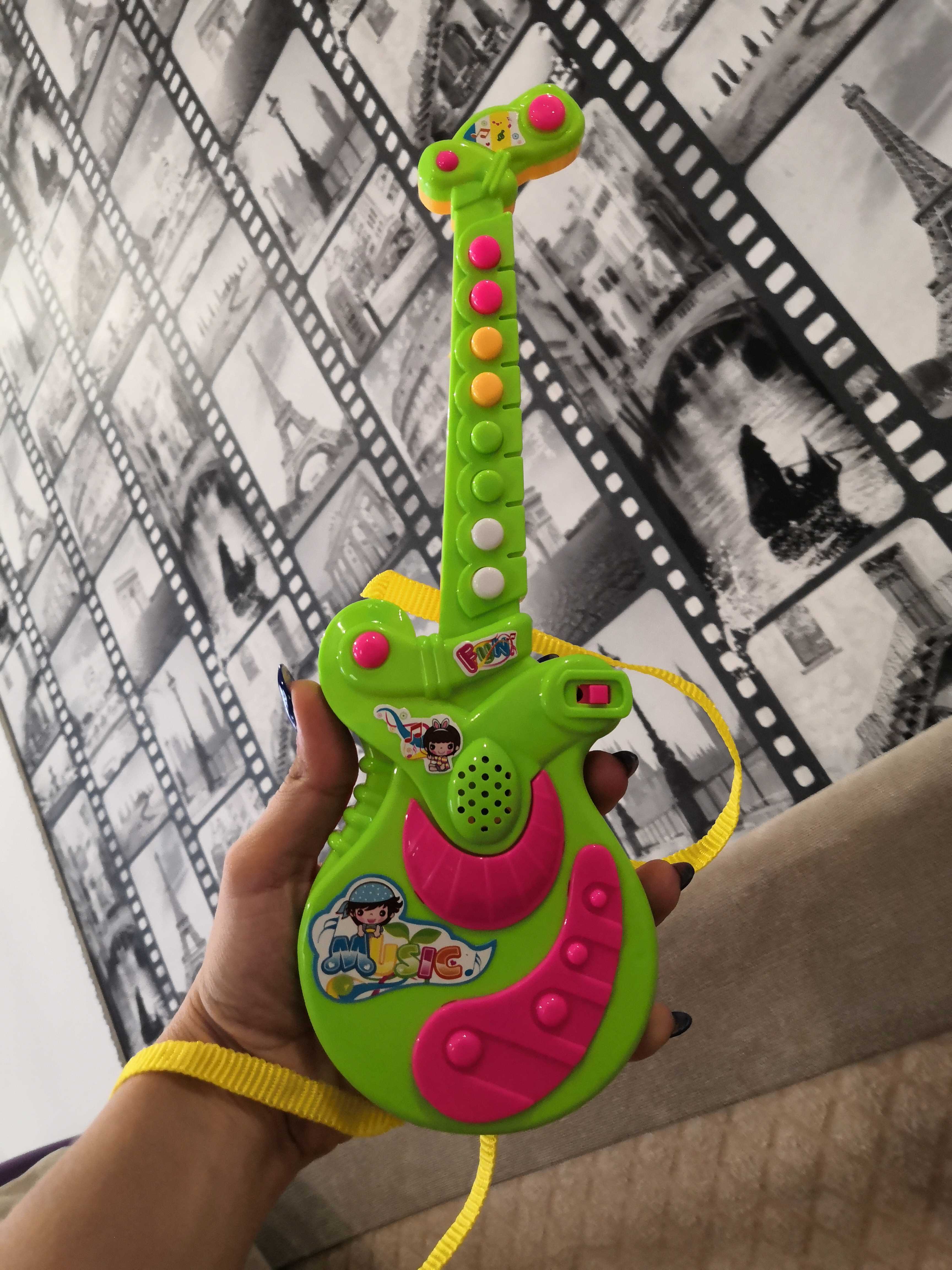Фотография покупателя товара Музыкальная игрушка гитара «Маленький музыкант», звуковые эффекты - Фото 1