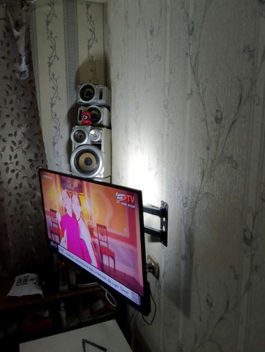 Фотография покупателя товара УЦЕНКА Кронштейн LuazON, для ТВ, наклонный, поворотный, от стены 80-460мм, 14-42", до 35кг,