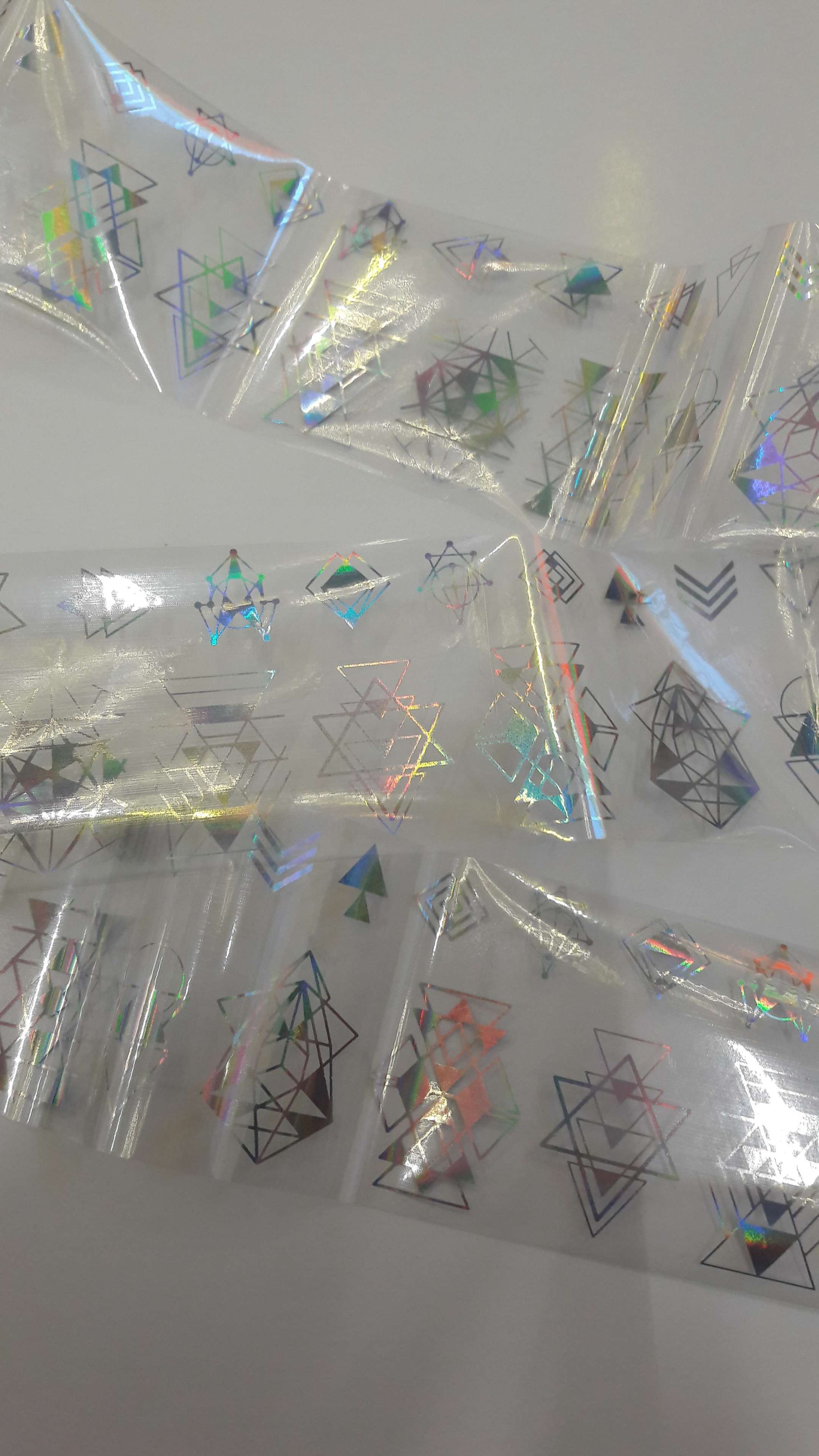 Фотография покупателя товара Переводная фольга для декора «Геометрия», с рисунком, 4 × 80 см, в пластиковом футляре, цвет голографичный серебристый - Фото 4