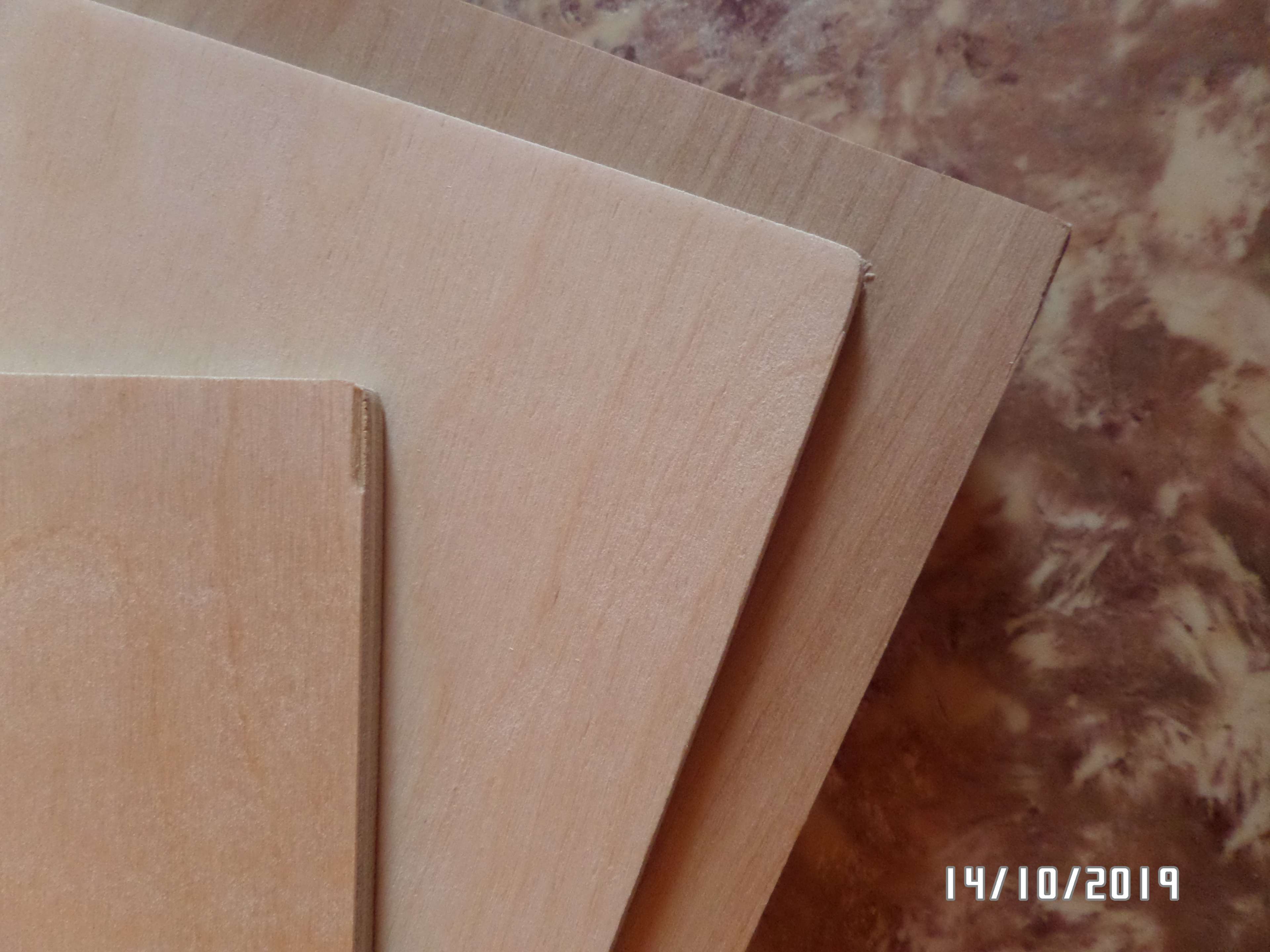 Фотография покупателя товара Доска разделочная деревянная с отверстием Доляна, 25×15×0,6 см, фанера - Фото 11