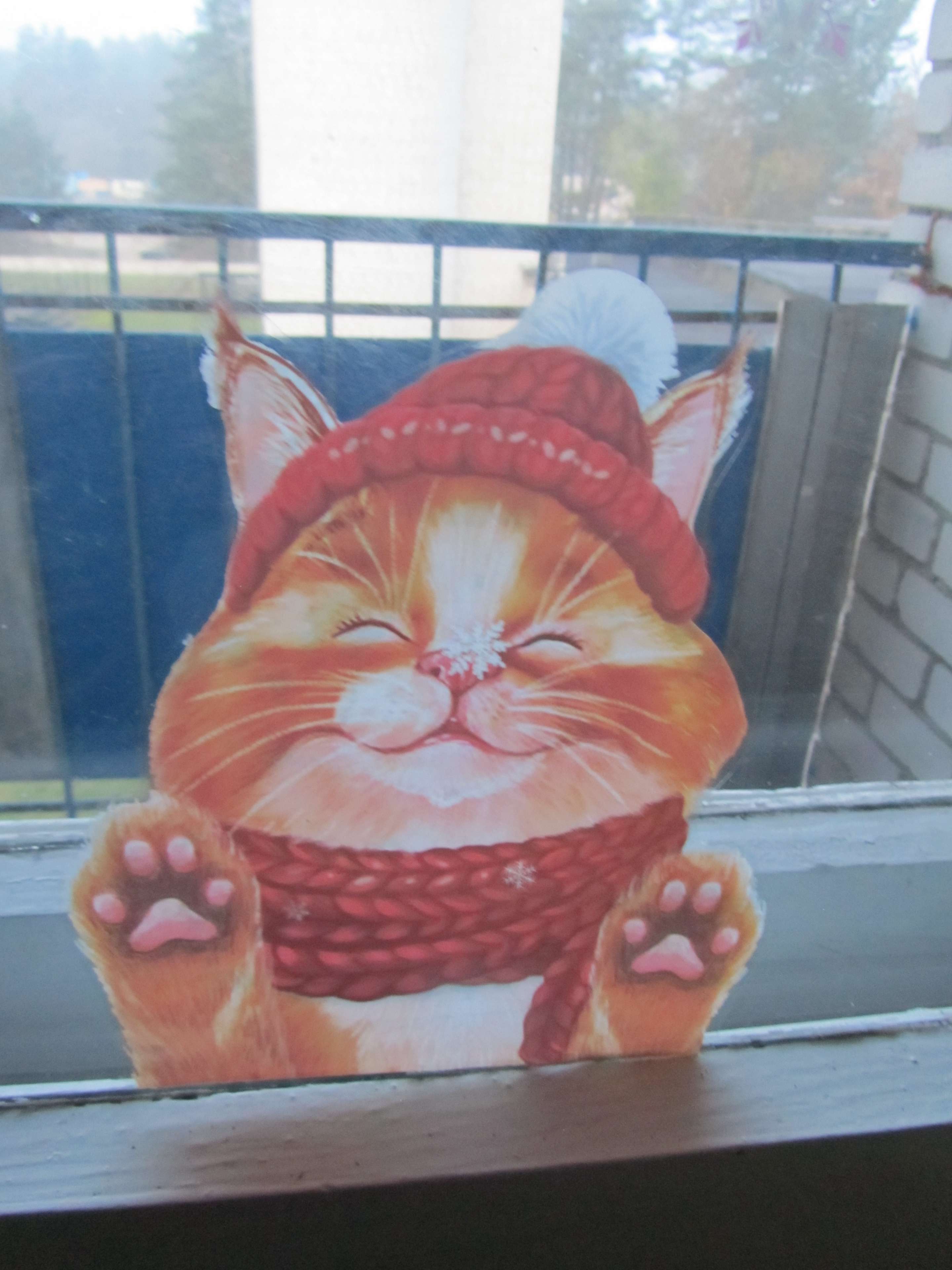 Фотография покупателя товара Наклейки на стекло «Новогодний котик», многоразовые, 20 × 34 см