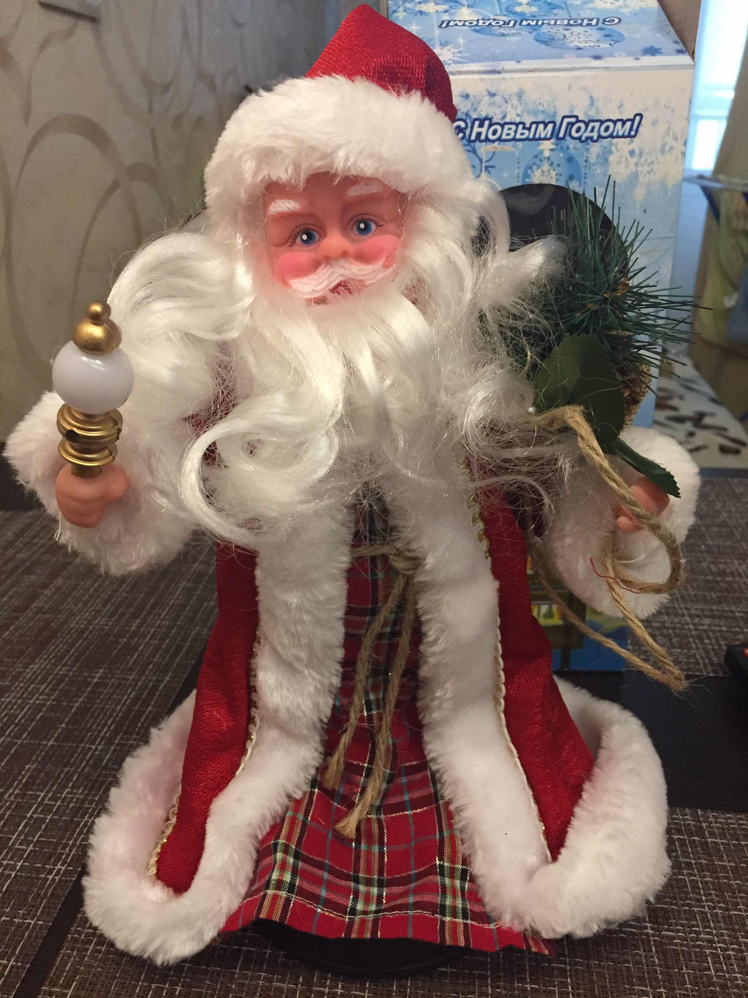 Фотография покупателя товара Дед Мороз "В красной шубке" двигается, 29 см, с подарками - Фото 6