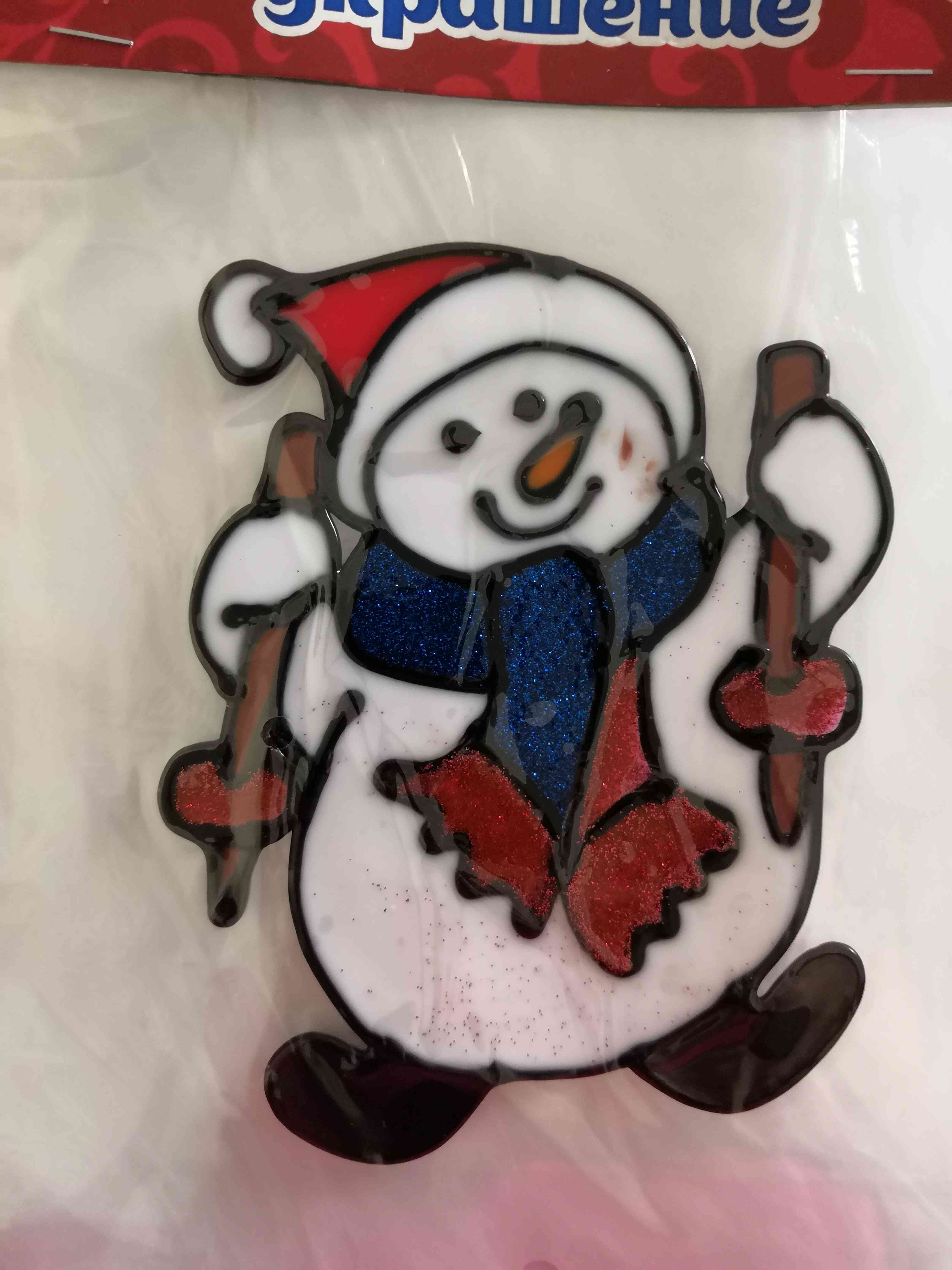Фотография покупателя товара Наклейка на стекло "Снеговик с лыжными палочками" 14,5х11 см