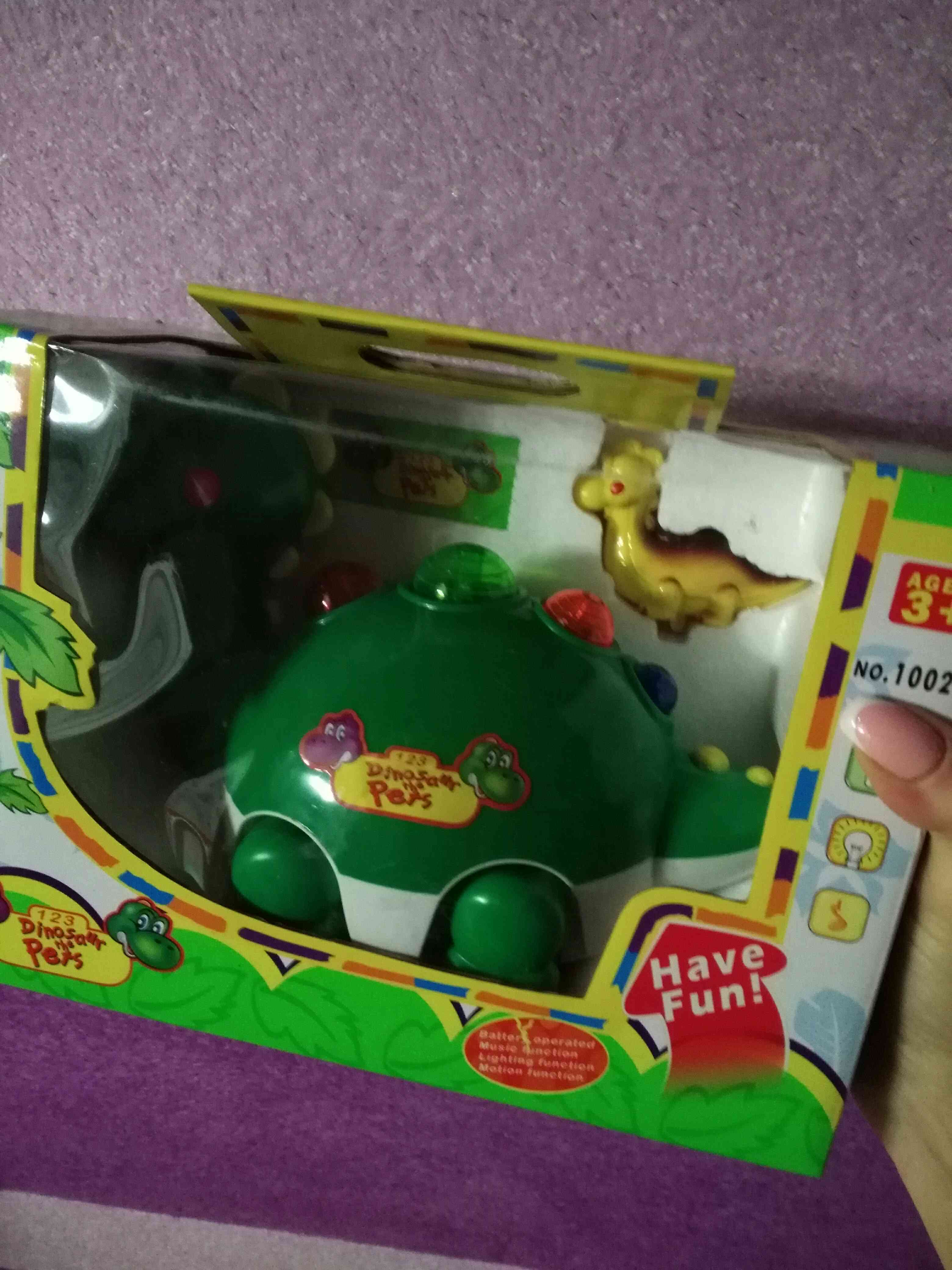 Фотография покупателя товара Музыкальная игрушка "Динозаврик с малышом", световые и звуковые эффекты - Фото 1