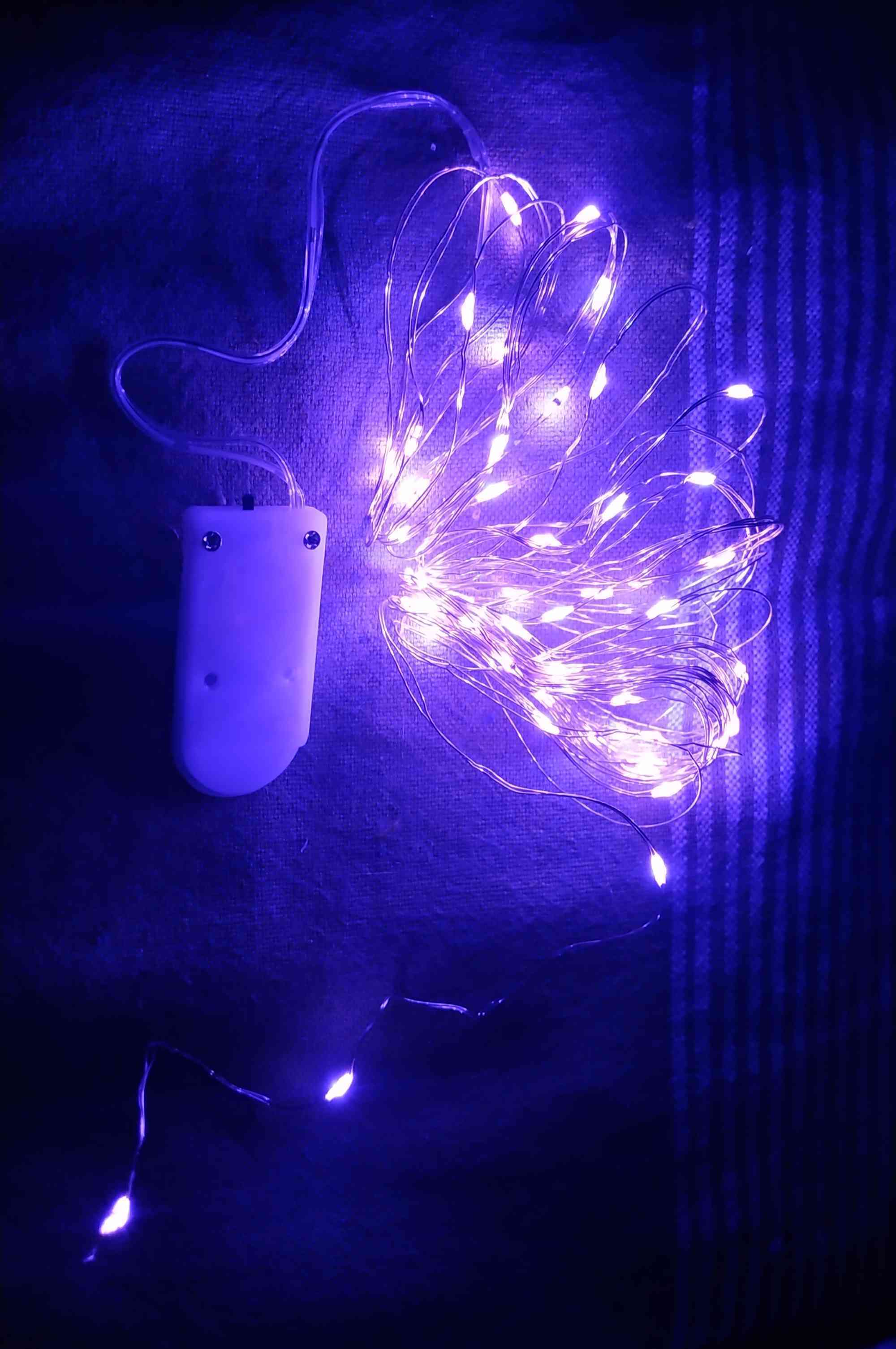 Фотография покупателя товара Гирлянда «Нить» 5 м роса, IP20, серебристая нить, 50 LED, свечение фиолетовое, CR2032х2 - Фото 14