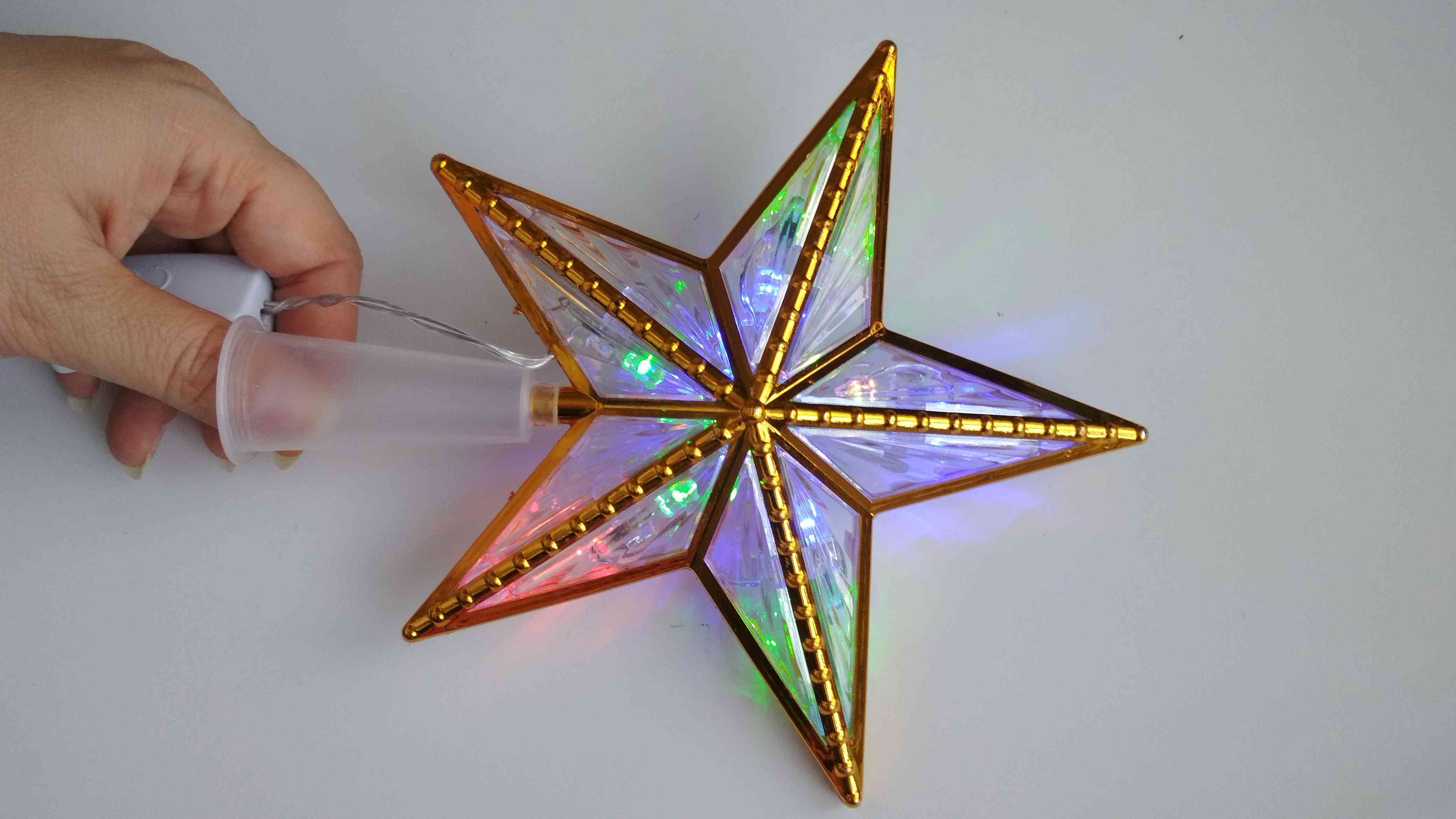 Фотография покупателя товара Светодиодная верхушка на ёлку «Звезда золотистая» 15 см, 10 LED, провод 2 метра, 220 В, свечение мульти - Фото 24